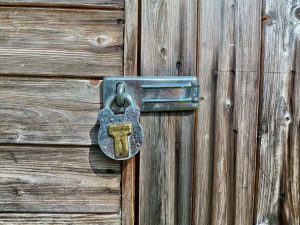 Lock with hanger on wooden door