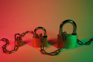 Picture of Locks with Chain on colorful Red Green Background with light effects